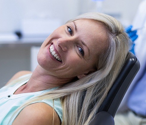 Woman with healthy smile after preventive dentistry checkup