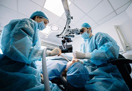 a dental team placing a dental implant
