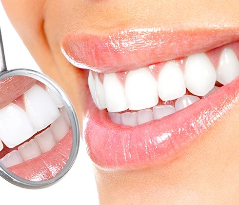 Closeup of healthy smile after gum disease treatment