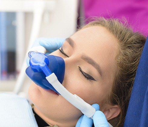 Patient receiving nitrous oxide sedation dentistry