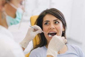 A woman at her dental exam.