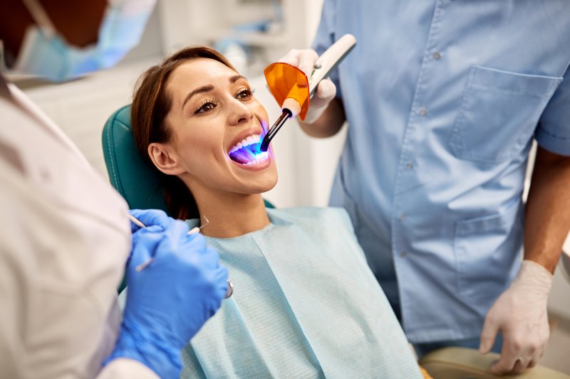 young patient getting dental filling 