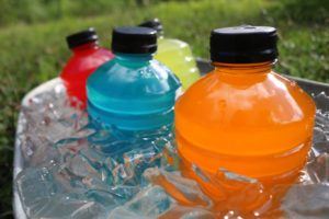 A bucket of sports drinks that a dentist says can be harmful to teeth