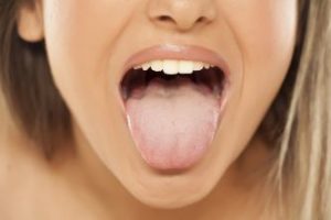 Woman sticking out her tongue